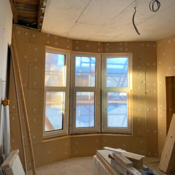 Interior image of a bay window in a flat with wood fibre insulation added