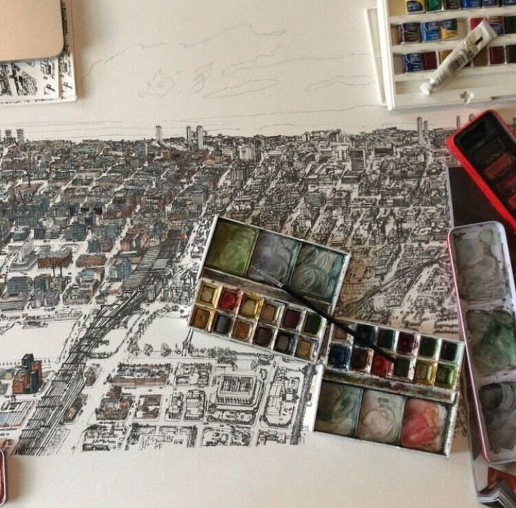 Watercolour pallets sitting on top of a line drawing of Glasgow city centre