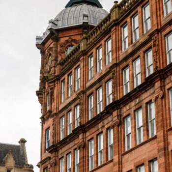 Photograph of a red sandstone building in Glasgow's Merchant City